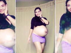 Dancing and Teasing Pregnant Babe